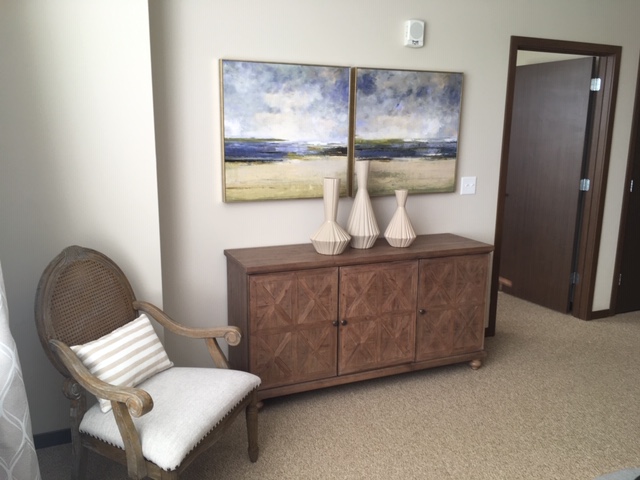 living room with dresser and painting