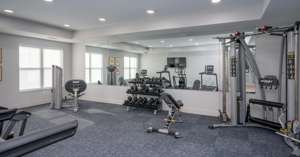A gym workout room at Lake Place apartments